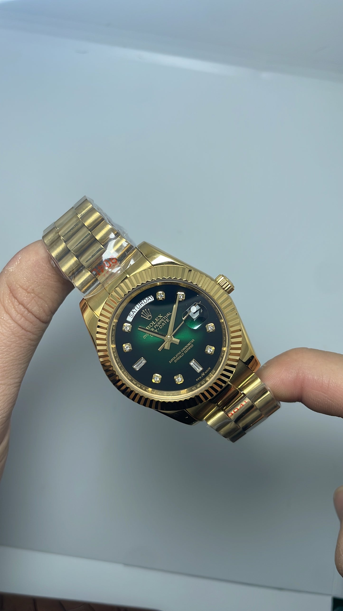 Day date total gold verde