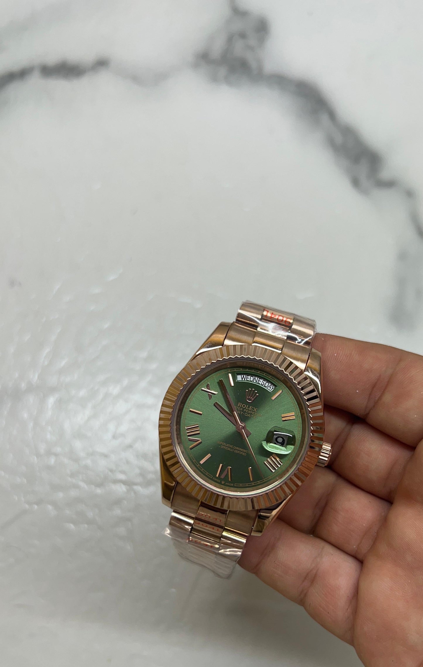 Day date oro rosa verde