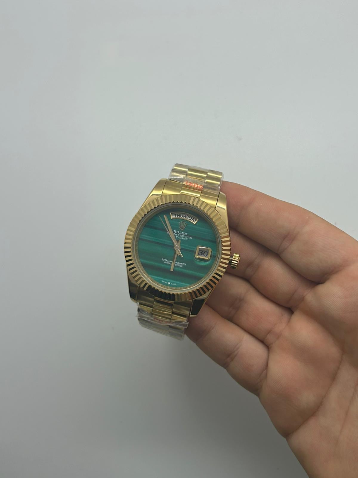 Day date oro legno verde