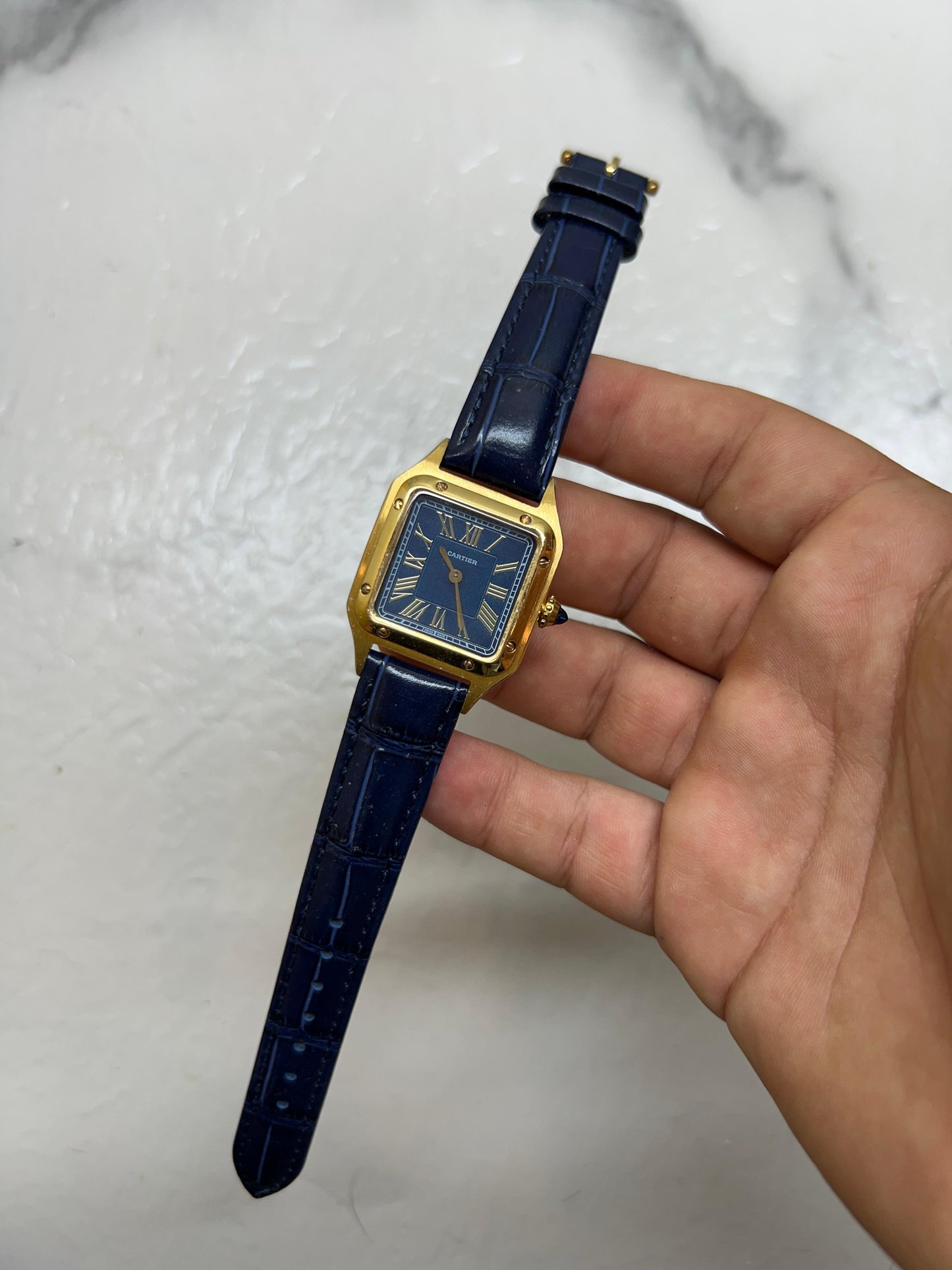 Dumond in pelle blu oro
