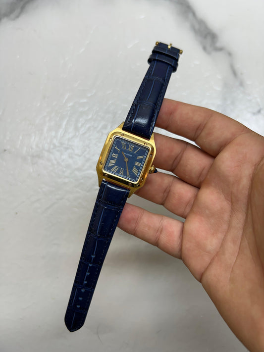 Dumond in pelle blu oro