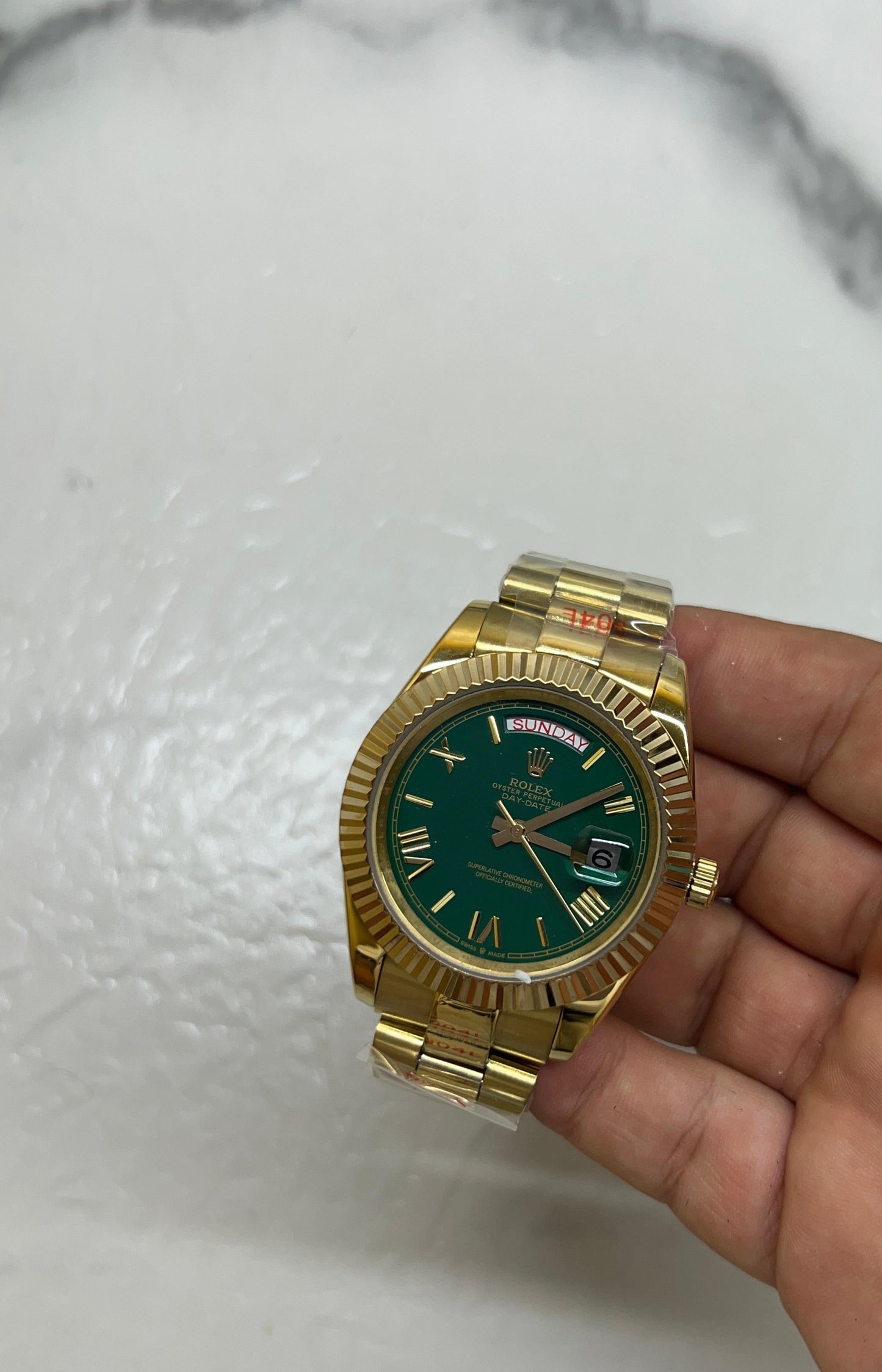 Day date oro verde